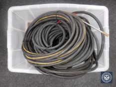 A box of pressure washer hoses