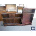 A set of oak open shelves and a set of stained pine shelves