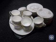 Fifty five pieces of Royal Doulton Yorkshire Rose tea and dinner ware