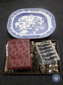 An antique blue and white meat plate, wooden cutlery tray and cutlery,