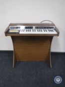 A mid 20th century Eko Tivoli electric organ