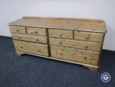 A Ducal Pine eight drawer chest