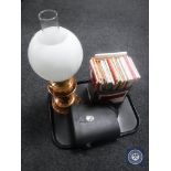 A tray of Duplex copper oil lamp with glass chimney and shade, set of cased binoculars,