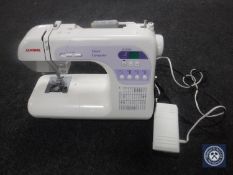 A Janome Decor PC model DC3050 electric sewing machine