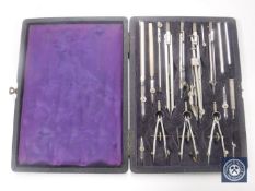 A set of cased drawing instruments