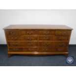 A Bevan Funnell Reprodux inlaid yew wood nine drawer chest