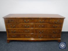 A Bevan Funnell Reprodux inlaid yew wood nine drawer chest