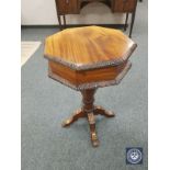 A Victorian style mahogany work table,