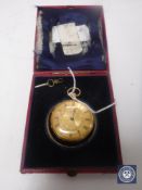 An 18ct gold pocket watch with key, gross weight 65.5g.