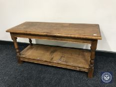 An oak pegged two tier coffee table