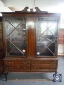 A Regency style display cabinet fitted four drawers