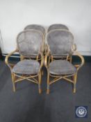 Four bamboo and wicker armchairs