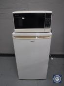 A Matsui under-bench fridge and a Sharp microwave