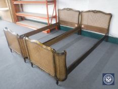 A pair of walnut bergere 3' bed frames