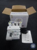 A boxed Gernome My Lock 204D electric sewing machine