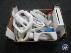 A box of Wii console and accessories
