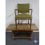 An oak refectory coffee table and an oak armchair