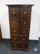 An Indonesian mahogany ten drawer chest