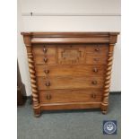 A Victorian mahogany eight drawer chest with barley twist supports,