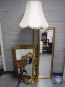 A brass column standard lamp and shade, pedestal wine table, gilt framed print,