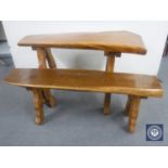 A shaped plank top kitchen table with bench