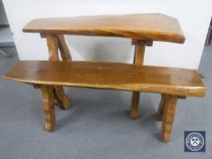 A shaped plank top kitchen table with bench