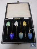 A set of silver and enamelled teaspoons, Birmingham marks, cased.
