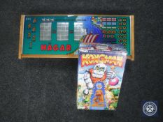 An illuminated glass Hagar panel together with a vintage boxed Kongman game