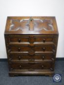 A 20th century oak writing bureau