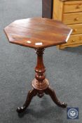 A Victorian octagonal pedestal occasional table