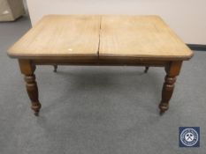 A Victorian mahogany dining table