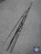 A three piece carp rod together with a two piece beach caster max fishing rod