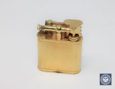 A gold plated Dunhill lighter CONDITION REPORT: There is no engraving/presentation