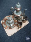 A tray containing six pieces of Eastern brass and plated ware including teapots, tankard,