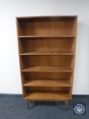 A set of mid 20th century teak open bookshelves