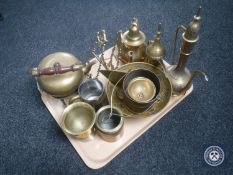 A tray of assorted brass wares including Eastern teapots, teapot on trivet, folding easel,