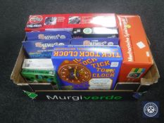 A box containing Airfix engineer kit, magnetic construction sets,