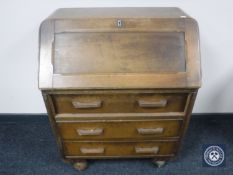 A 1930's oak writing bureau