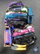 Two boxes containing a large quantity of assorted hold alls and back packs