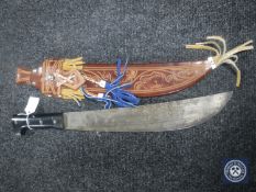 A machete in leather sheath