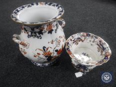 A Victorian floral pattern tureen and a Victorian floral pottery planter