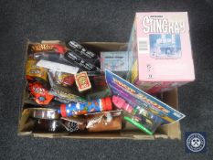A box containing assorted toys including Schleich Native Americans, Matchbox Stingray submarine,