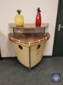 A mid 20th century illuminated bar modelled as a ship's hull,