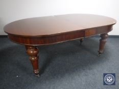 An oval Victorian mahogany windout dining table with winder CONDITION REPORT: The