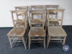 A set of six antique chapel chairs