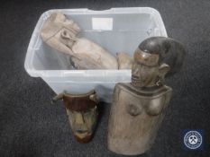 A box of tribal carving and wall masks