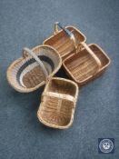 Four vintage wicker shopping baskets