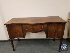 A 19th century mahogany serpentine fronted sideboard,