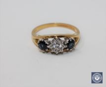 An 18ct gold sapphire and diamond three-stone ring,