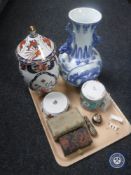 A tray containing oriental style vases and lidded pots, boxed Chinese health balls,